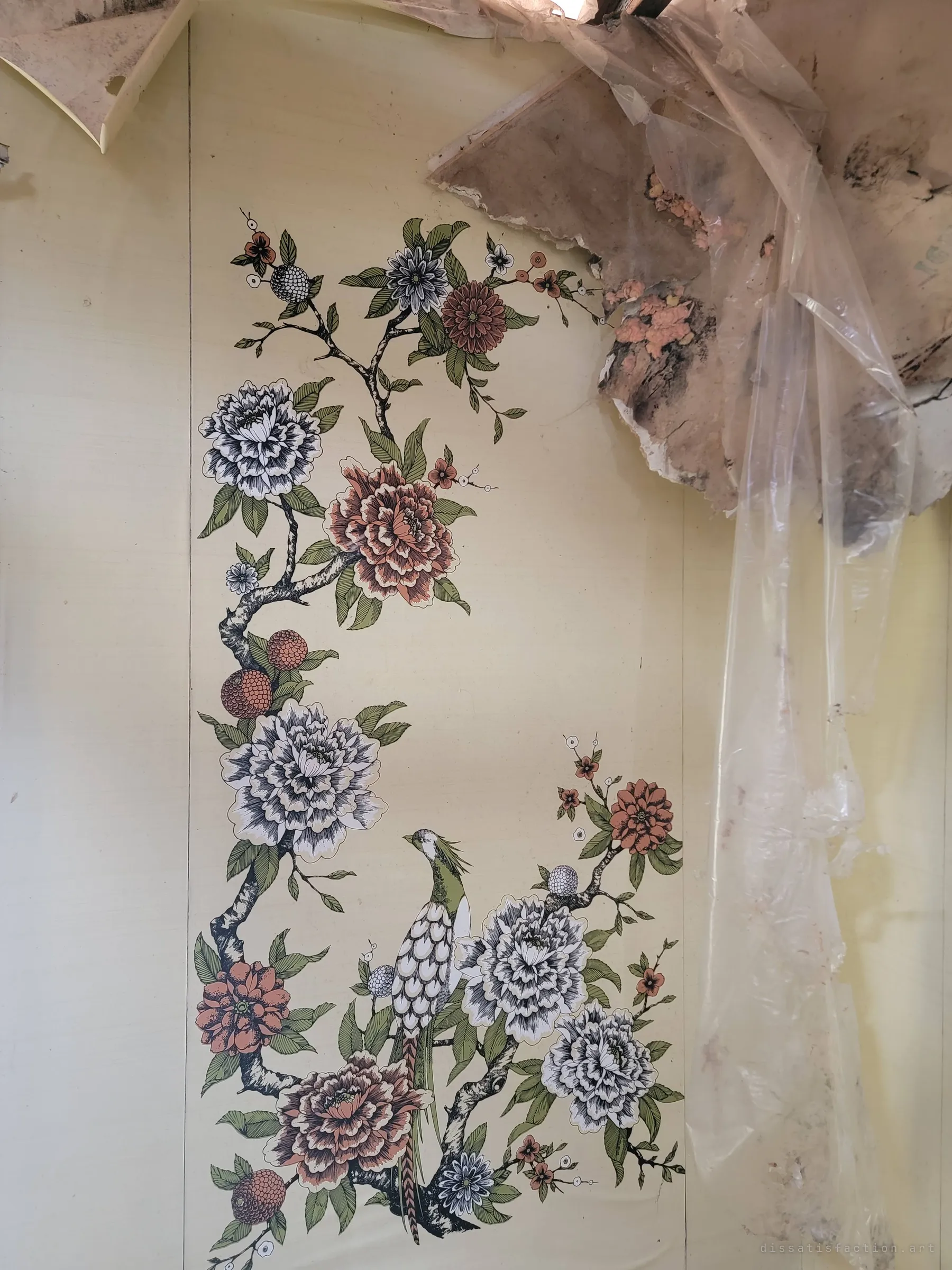 Detail of the painted wall panel: a pheasant perched among peonies and blossoms, still bright under torn plastic sheeting and a crumbling ceiling.
